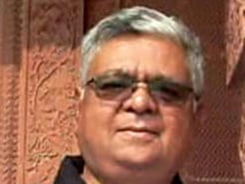 Portrait of Dr Rajesh Kalraiya